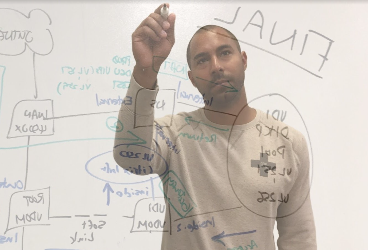 Working through a network design on the whiteboard